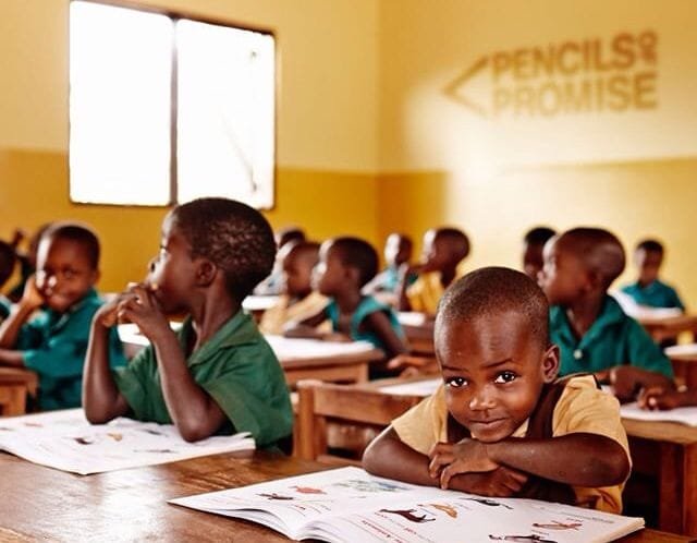 Children engaged in writing activities